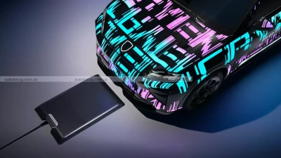 Забудьте про дроти: електричний Porsche Cayenne може заряджатися без проводів